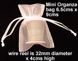 reel of wire in a mini bag