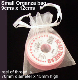 reel in a small organza bag